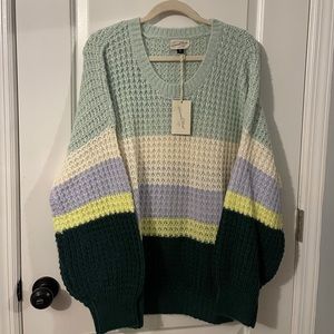Cozy tricolor sweater.